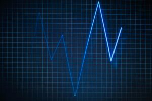 ECG graph on a grid background symbolizing heartbeat and medical data.